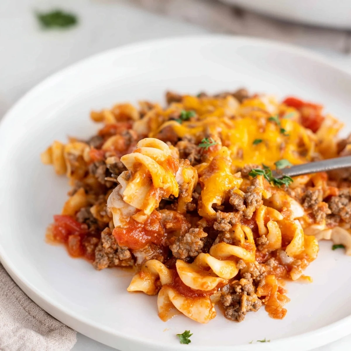 Warm Beef Noodle Casserole served with crisp green salad and garlic bread