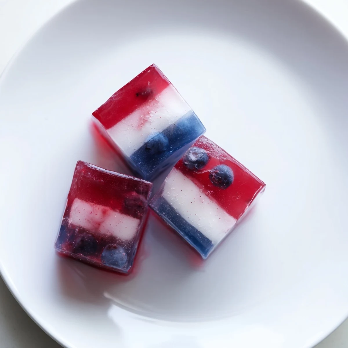 Red White And Blue Ice Cubes Recipe glossy frozen layers, perfect for patriotic parties