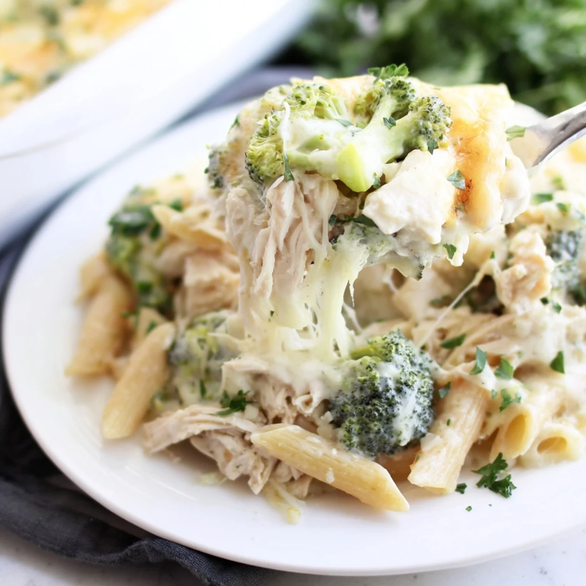 Weeknight Chicken Broccoli Alfredo Bake recipe cheesy, fragrant, served with garlic bread