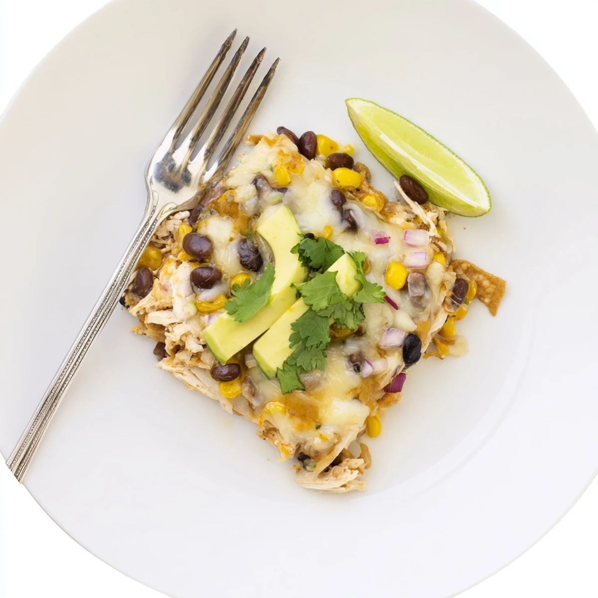 Bubbly Salsa Verde Chicken Casserole fresh from oven with melted cheese