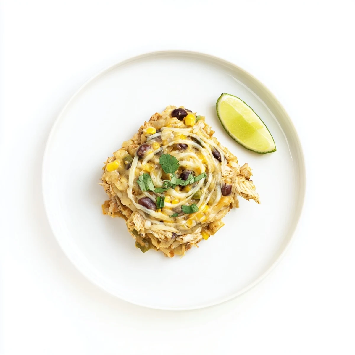 Salsa Verde Chicken Casserole topped with cilantro and avocado slices, zesty